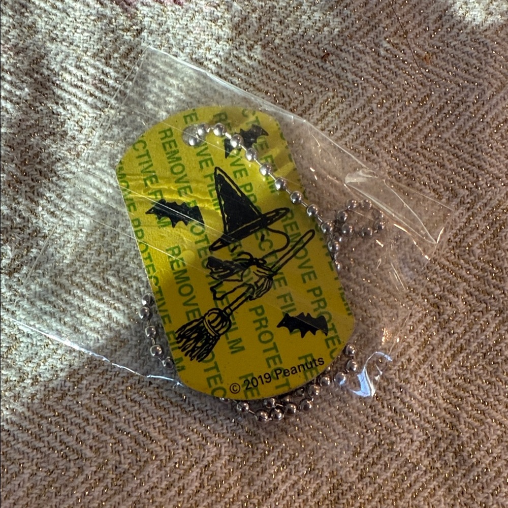 Peanuts Yellow Halloween Witch Dog Tag